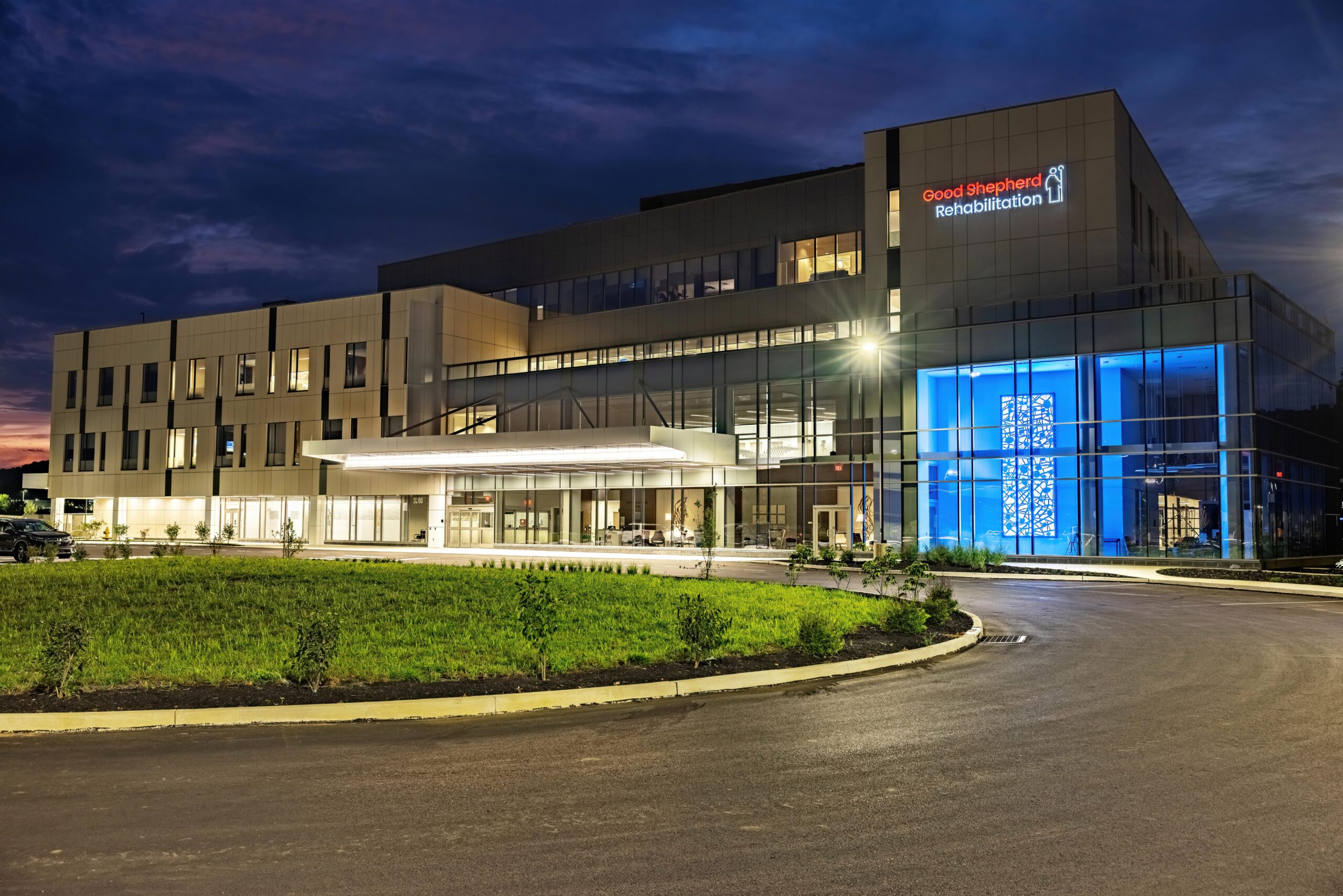 Nighttime view of the Good Shepherd Rehabilitation Hospital in Center Valley.