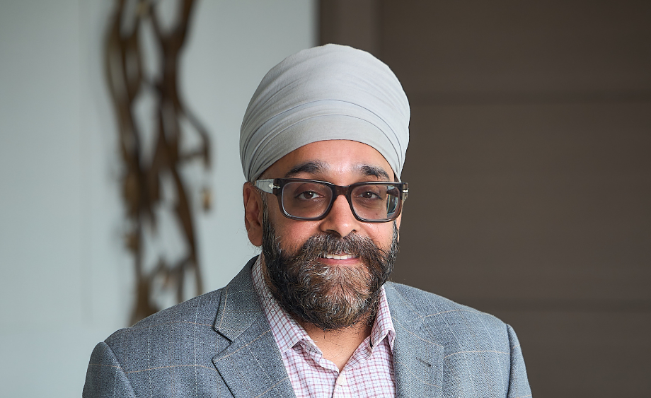 Sandeep Singh, MD, stands in the lobby of Good Shepherd Rehabilitation Hospital in Center Valley, Pennsylvania